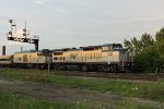 A rare "doubleheaded" Hiawatha glides past in the evening light